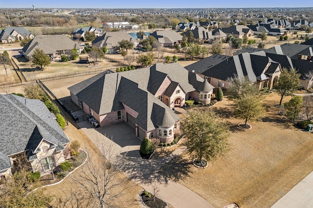 birds eye view of property with a residential view