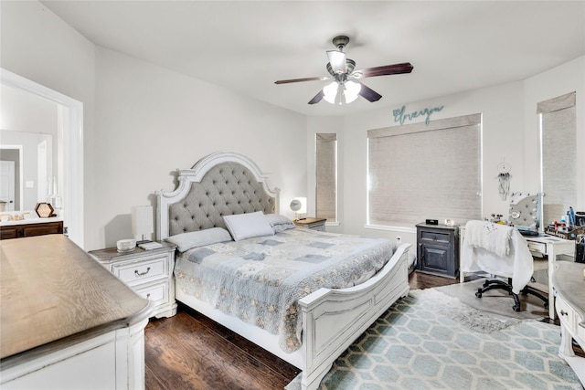 bedroom with dark wood-type flooring and a ceiling fan