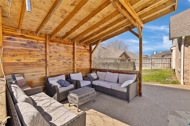 view of patio / terrace featuring a fenced backyard and an outdoor living space