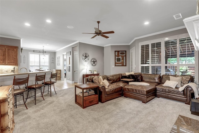 living room with crown molding, light tile patterned floors, recessed lighting, visible vents, and ceiling fan