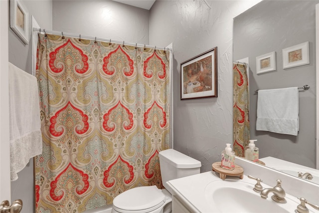 2104 Germantown, Mckinney, TX 75070 - bathroom with vanity, toilet, and curtained shower