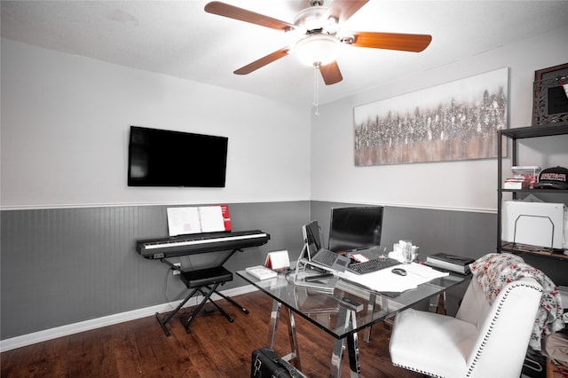 office space featuring ceiling fan, baseboards, wood finished floors, and wainscoting