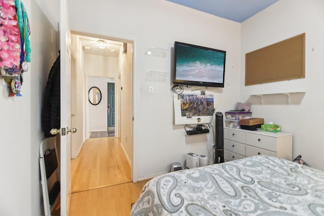 bedroom featuring light wood-type flooring