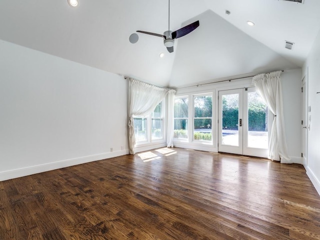 unfurnished living room featuring visible vents, high vaulted ceiling, baseboards, and wood finished floors