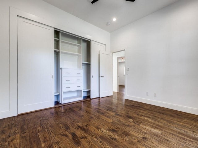 unfurnished bedroom featuring a ceiling fan, baseboards, dark wood finished floors, recessed lighting, and a closet