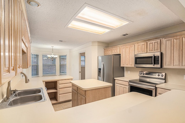 kitchen featuring light tile patterned floors, visible vents, light brown cabinetry, appliances with stainless steel finishes, and a sink