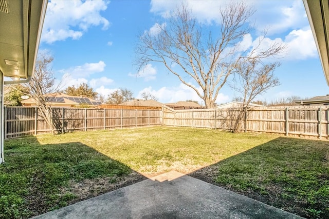 view of yard with a fenced backyard