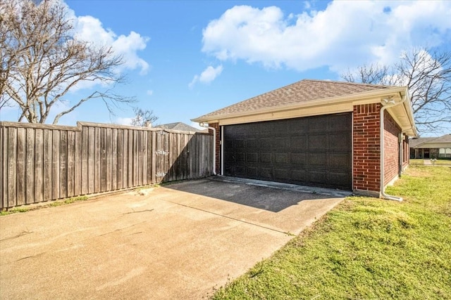 garage with fence