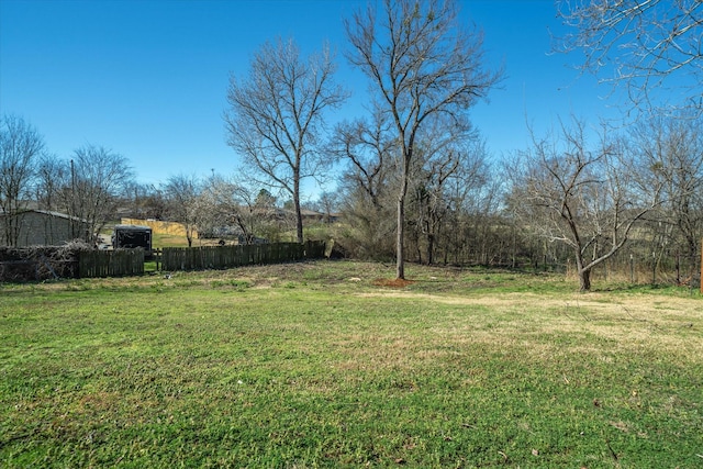 view of yard with fence