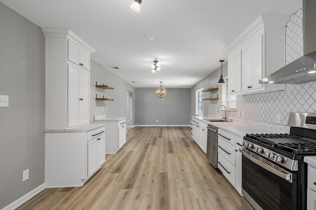 kitchen with wall chimney range hood, stainless steel appliances, open shelves, and a sink