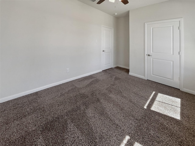 unfurnished bedroom with carpet floors, ceiling fan, and baseboards