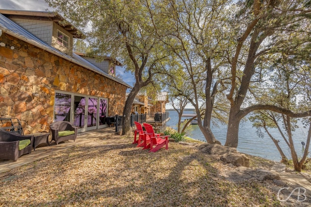 view of yard with a water view