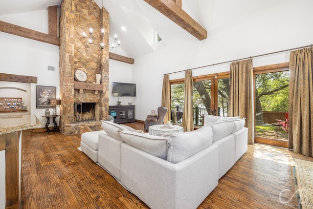 living room with high vaulted ceiling, a stone fireplace, visible vents, beam ceiling, and dark wood-style floors