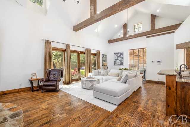 living room featuring baseboards, wood finished floors, beamed ceiling, french doors, and high vaulted ceiling