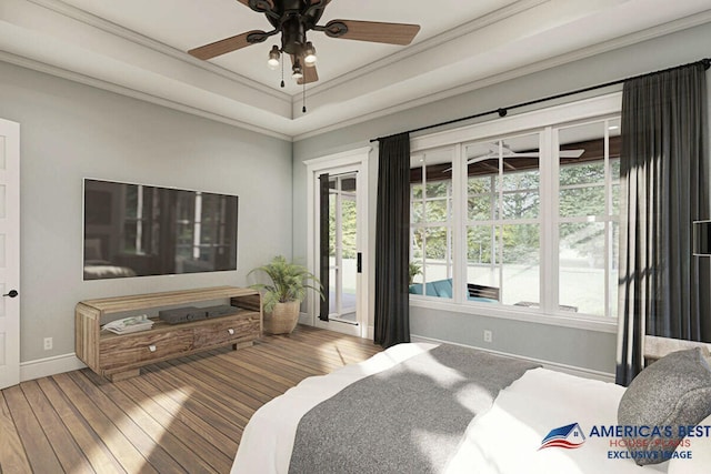 bedroom with access to exterior, multiple windows, ornamental molding, and hardwood / wood-style flooring