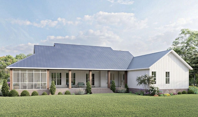 view of front of home featuring a sunroom, metal roof, a front lawn, and board and batten siding