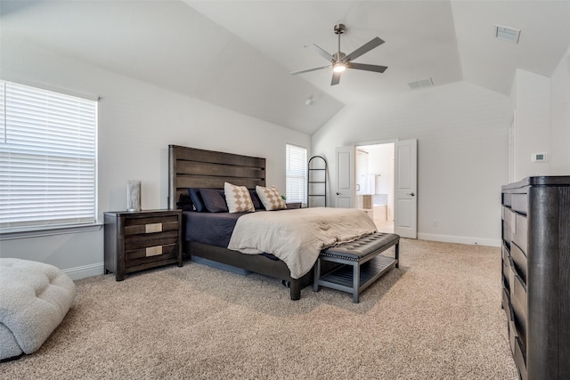 bedroom with vaulted ceiling, baseboards, visible vents, and light carpet