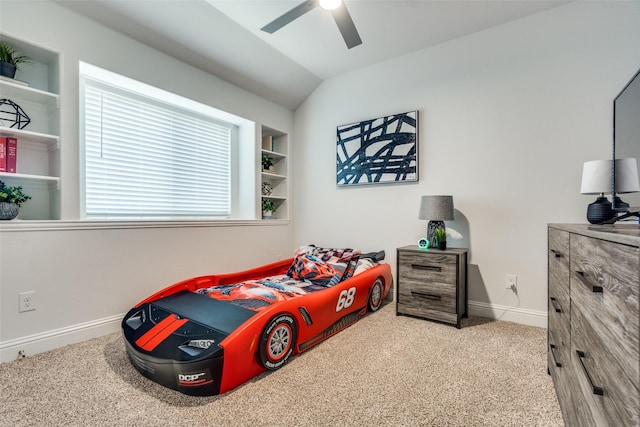 bedroom featuring lofted ceiling, carpet flooring, a ceiling fan, and baseboards