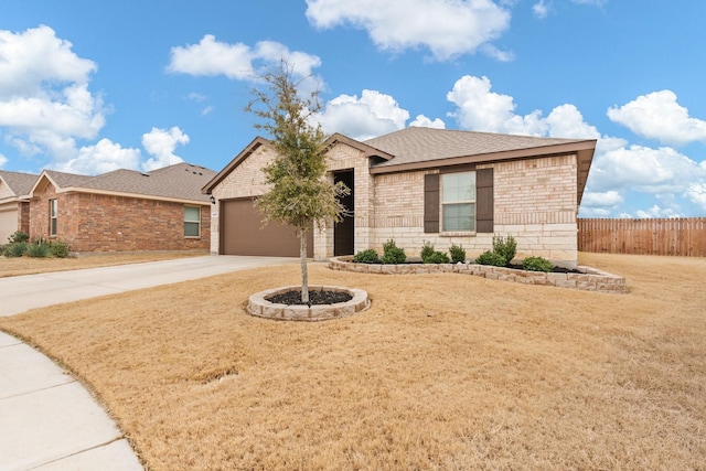 single story home with brick siding, a shingled roof, concrete driveway, an attached garage, and fence