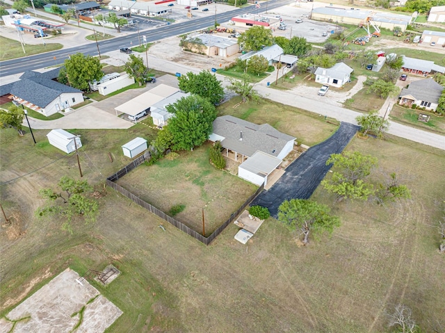 birds eye view of property with a residential view