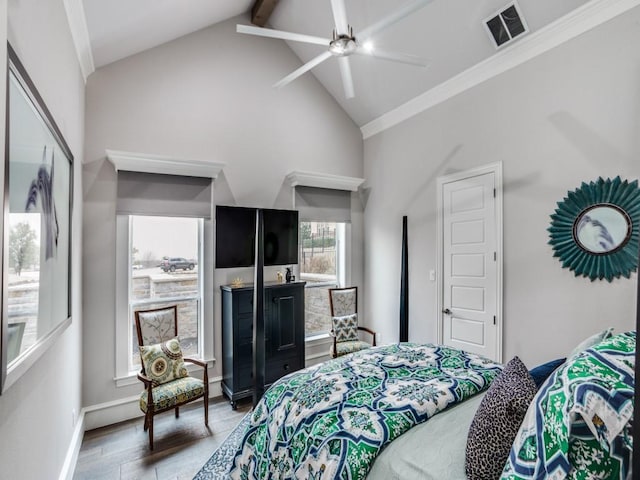 bedroom with high vaulted ceiling, wood finished floors, visible vents, baseboards, and beamed ceiling