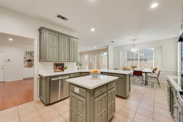 kitchen featuring a kitchen island, visible vents, dishwasher, and gray cabinetry