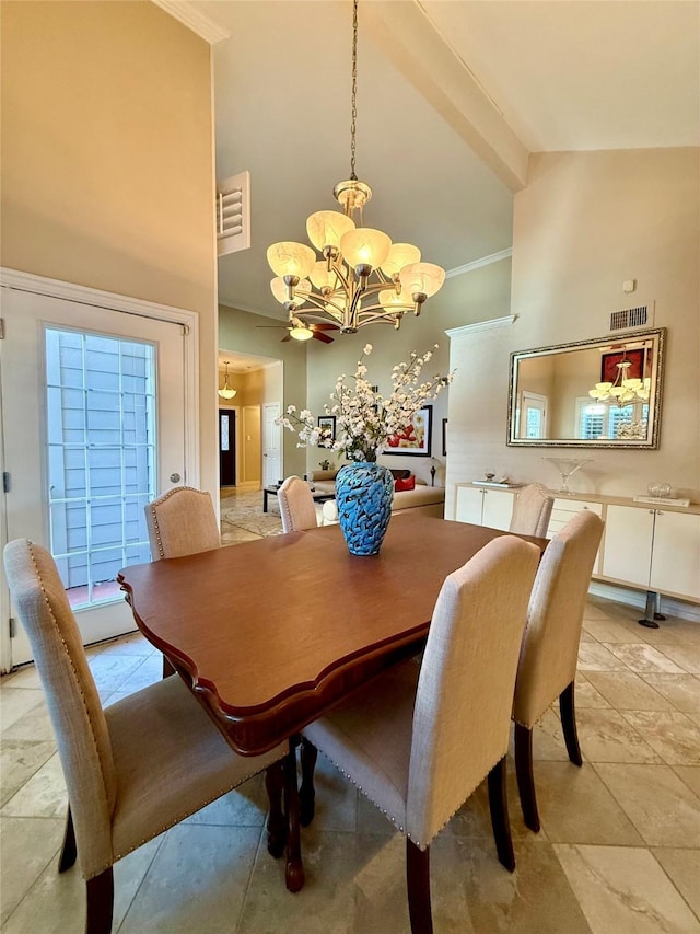 dining room with visible vents, a chandelier, beamed ceiling, crown molding, and high vaulted ceiling