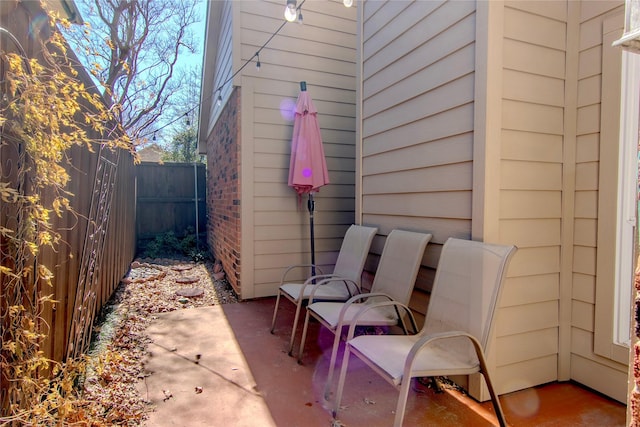 view of patio / terrace with fence