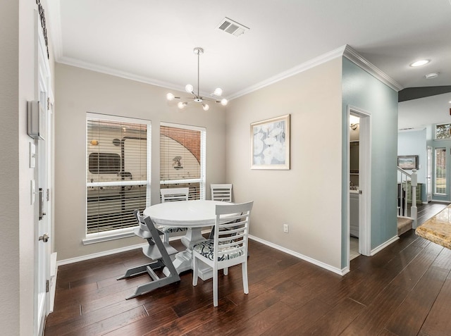 dining space featuring dark wood-style floors, ornamental molding, visible vents, and baseboards