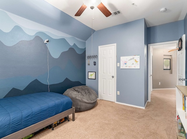 carpeted bedroom with a ceiling fan, visible vents, vaulted ceiling, and baseboards