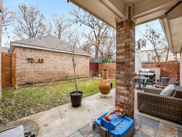 view of patio with a fenced backyard