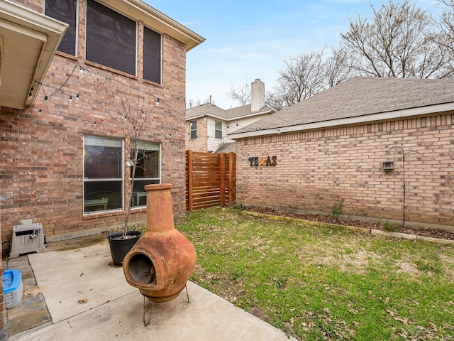 view of yard featuring a patio area and fence