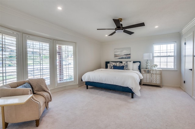 bedroom with light carpet, recessed lighting, baseboards, and crown molding