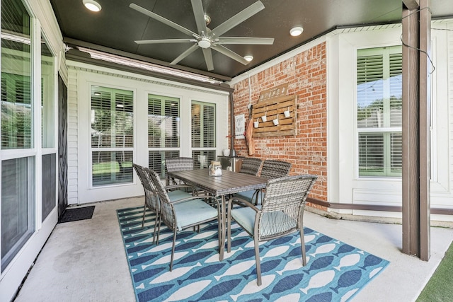 view of patio / terrace featuring outdoor dining space and ceiling fan