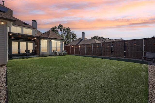 view of yard with a patio area and fence