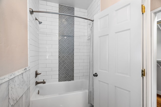 bathroom featuring shower / bath combination with curtain