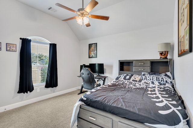 carpeted bedroom with visible vents, vaulted ceiling, baseboards, and ceiling fan