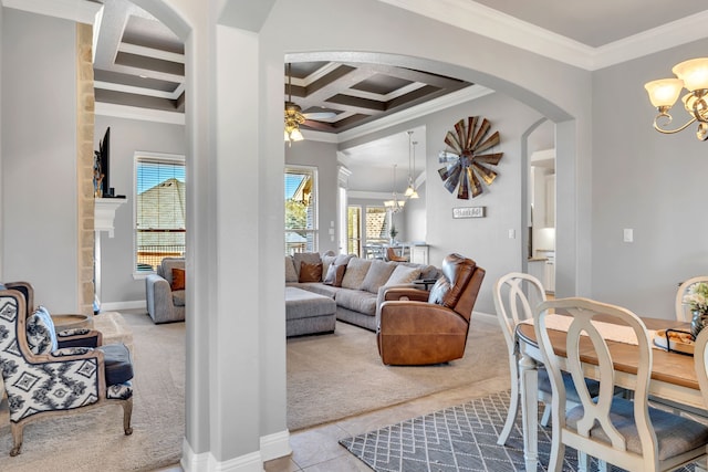 tiled living area featuring arched walkways, coffered ceiling, crown molding, and carpet