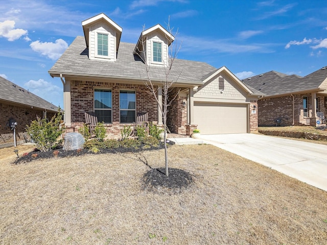 view of front of home featuring driveway, brick siding, a porch, and an attached garage