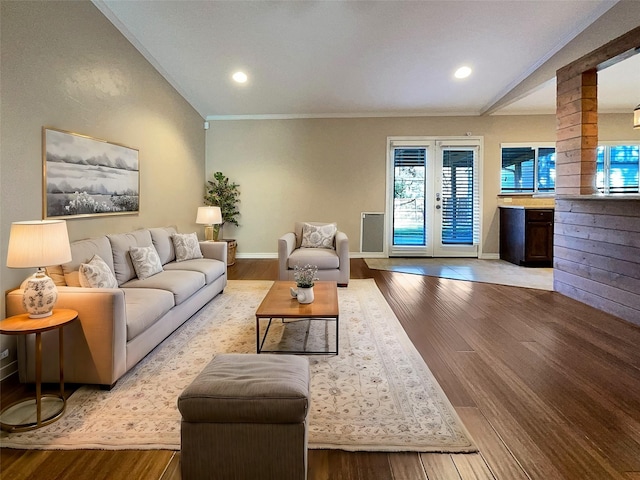 living area featuring recessed lighting, french doors, baseboards, and wood finished floors