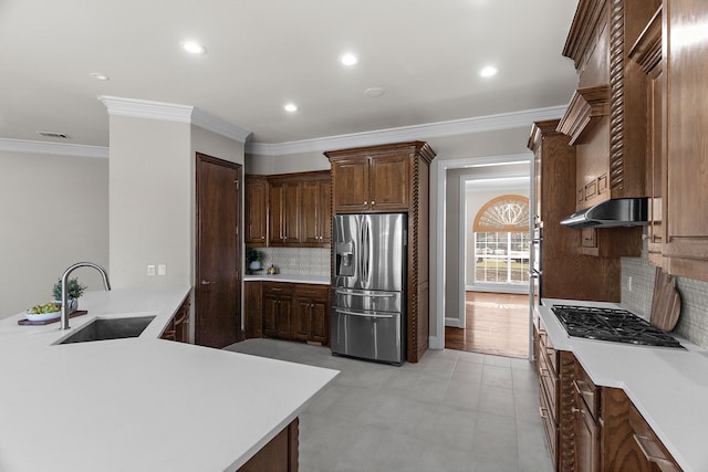 100 Bailee Ct, Forney, TX 75126 - kitchen with appliances with stainless steel finishes, a sink, light countertops, tasteful backsplash, and recessed lighting