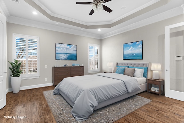 100 Bailee Ct, Forney, TX 75126 - bedroom with wood finished floors, a tray ceiling, ornamental molding, recessed lighting, and ceiling fan