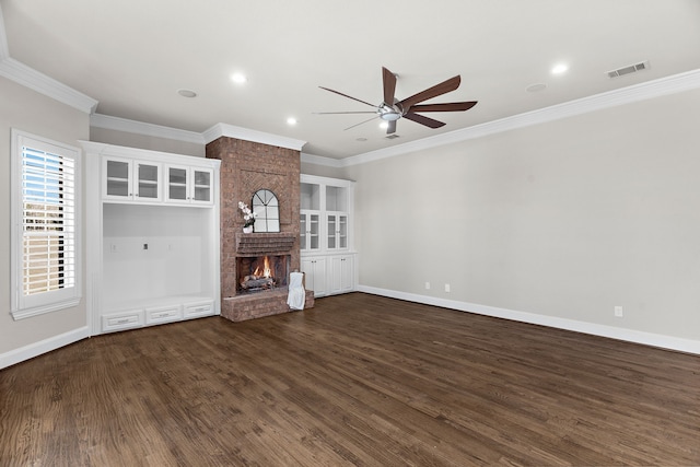 100 Bailee Ct, Forney, TX 75126 - unfurnished living room with ceiling fan, crown molding, dark wood-style flooring, a brick fireplace, and baseboards