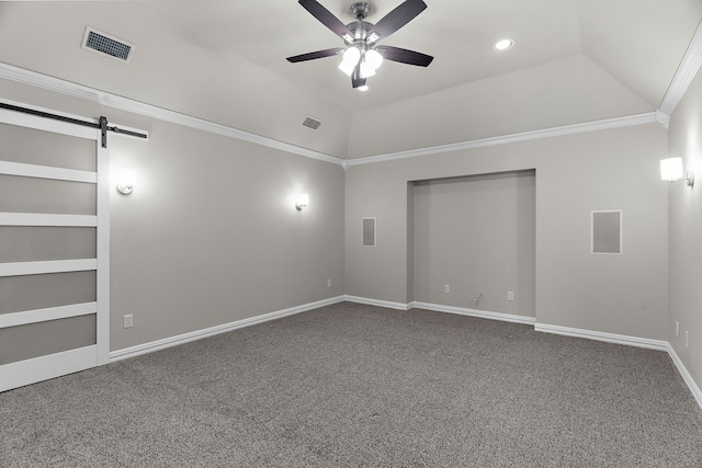 100 Bailee Ct, Forney, TX 75126 - empty room with ceiling fan, a barn door, carpet, ornamental molding, and vaulted ceiling