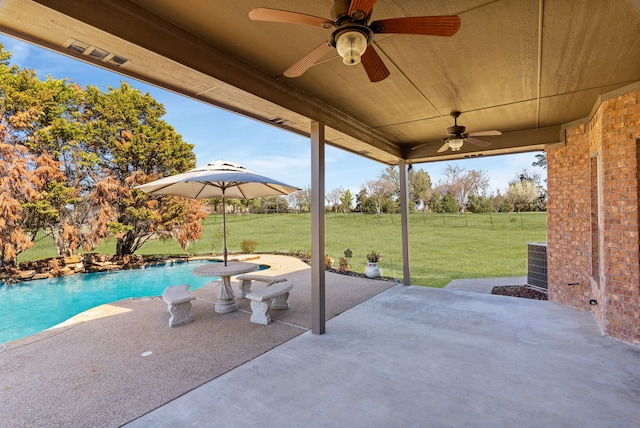 100 Bailee Ct, Forney, TX 75126 - view of patio / terrace featuring a ceiling fan, an outdoor pool, and central AC unit