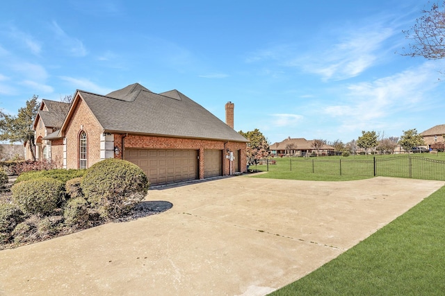 100 Bailee Ct, Forney, TX 75126 - view of side of property with brick siding, concrete driveway, an attached garage, a chimney, and a shingled roof