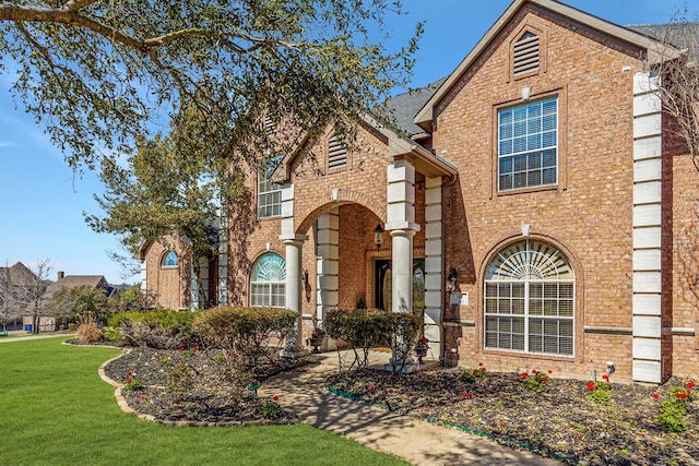 100 Bailee Ct, Forney, TX 75126 - traditional home with brick siding and a front yard