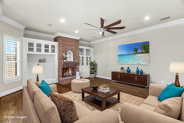 100 Bailee Ct, Forney, TX 75126 - living area featuring a ceiling fan, wood finished floors, baseboards, ornamental molding, and a fireplace