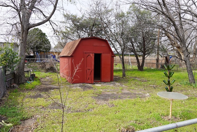 view of shed featuring a fenced backyard