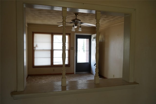 doorway with a ceiling fan